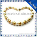 A 9-10MM Near Round Freshwater White and Gold 2014 necklace